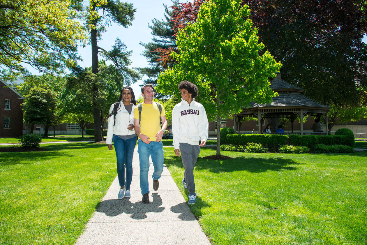 Students walking outdoors on campus.