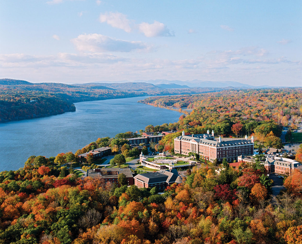 Aerial view of college campus with fall foliage.